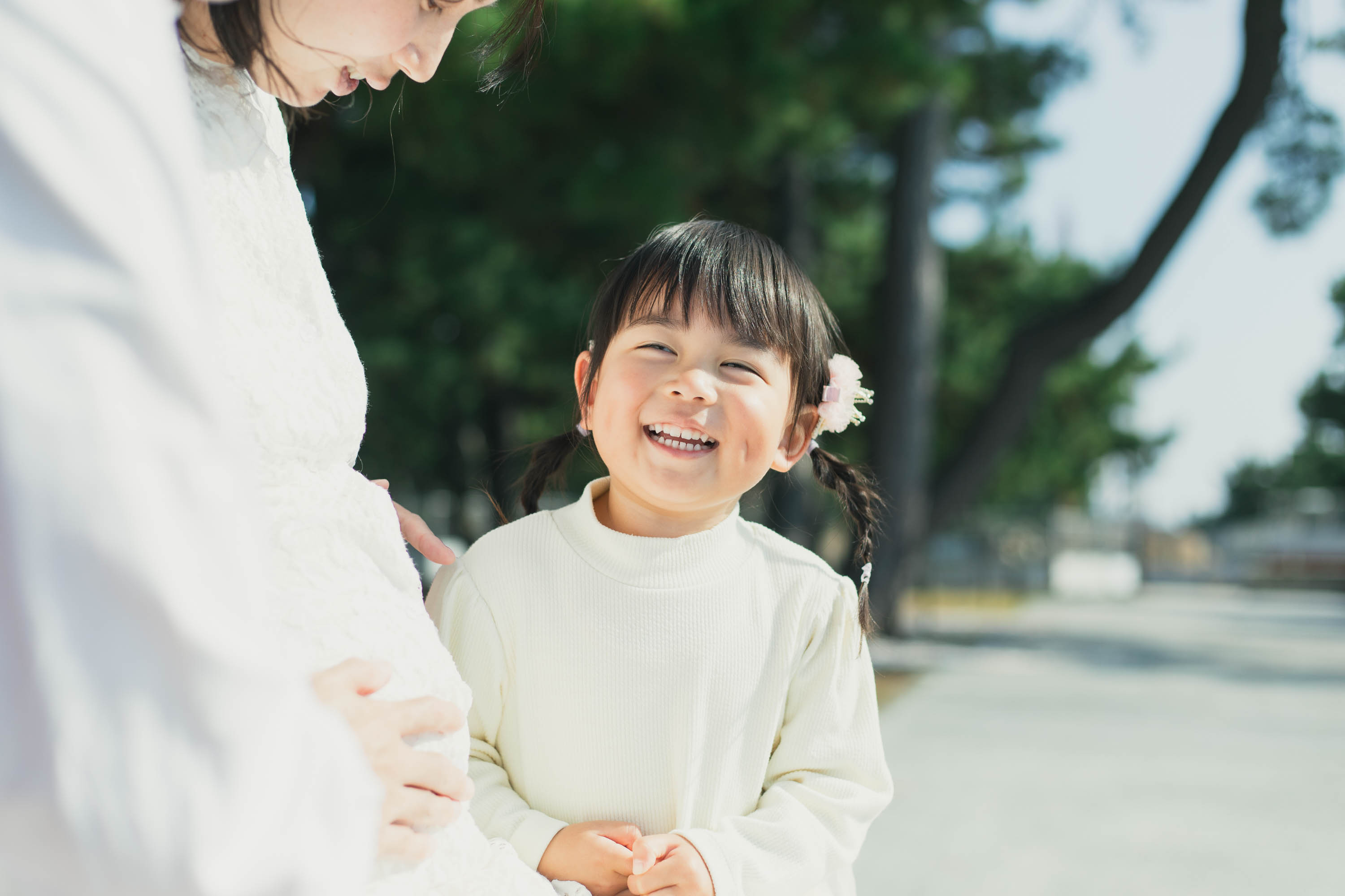 女の子がニコニコしている写真